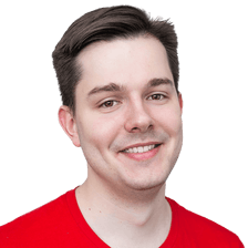 Yegor Usoltsev smiling in a red shirt